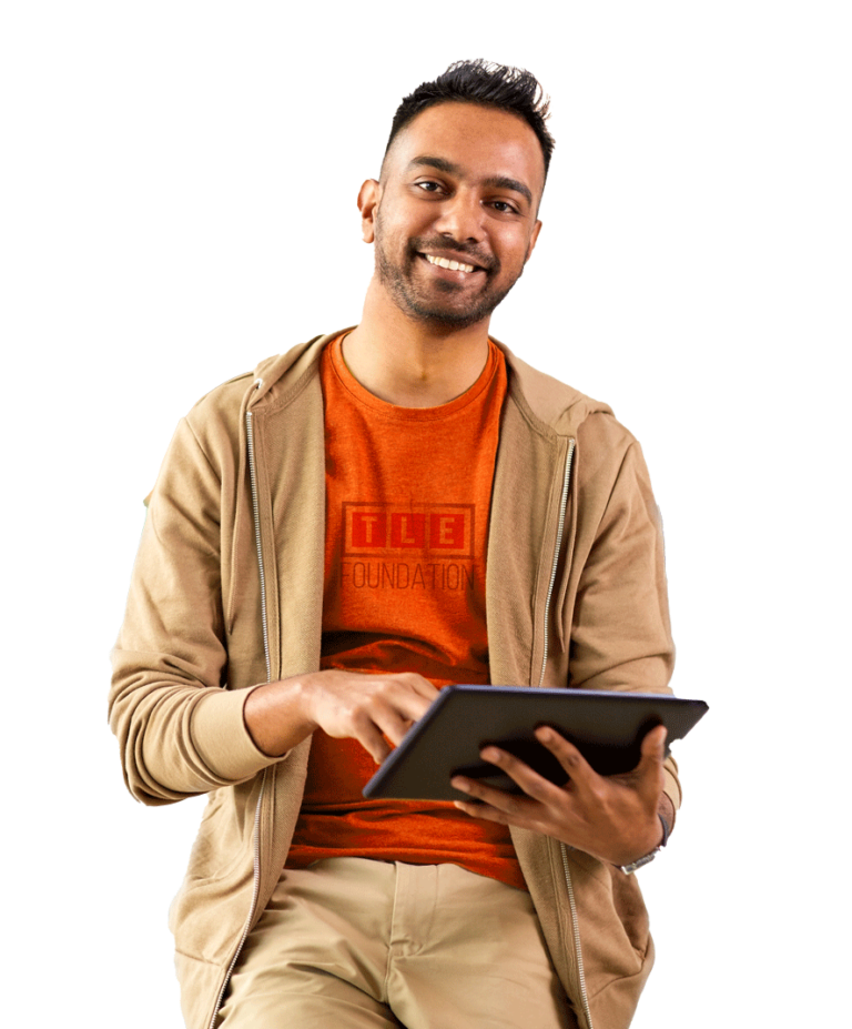 man with tablet smiling